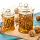 Nuts with honey: properties and recipes