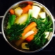 What is blanching vegetables and how is it performed?